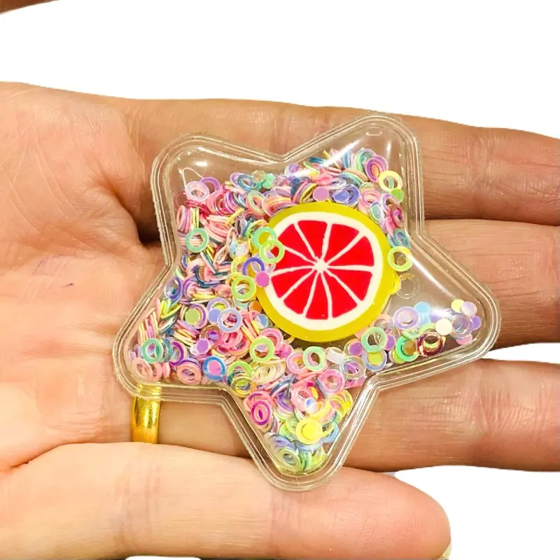 Aplique em Plástico transparente ESTRELA LANTEJOULAS COLORIDAS COM LARANJA 5cm - Estrela com Laranja e  Glitter Colorido